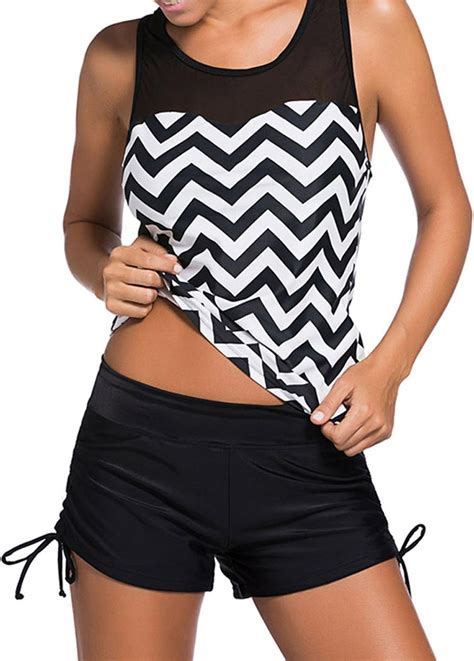About this item 【PLUS SIZE 3 PIECE TANKINI】This plus size 3 piece swimsuit includes an athletic tank top, sports bra, and boy shorts. It offers two wearing styles: one is the sports bra paired with board shorts to wear as a bikini set, and the other is worn as an athletic 3 piece tankini paired with a tummy control …
